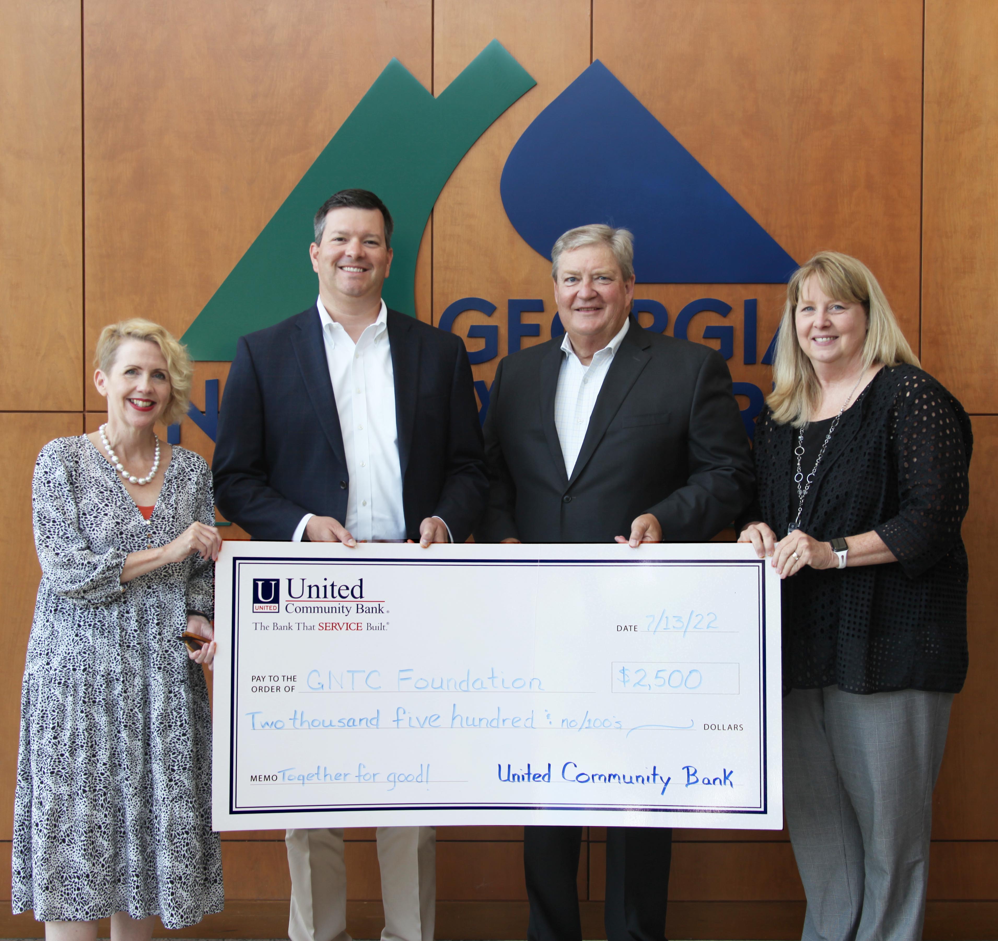 (From left) Lauretta Hannon, executive director of the GNTC Foundation; Jarrod S. Floyd, UCB senior vice president/commercial relationship manager; Scott Tucker, UCB northwest Georgia region president; and Dr. Heidi Popham, president of GNTC, announce the UCB Foundation’s donation to GNTC.