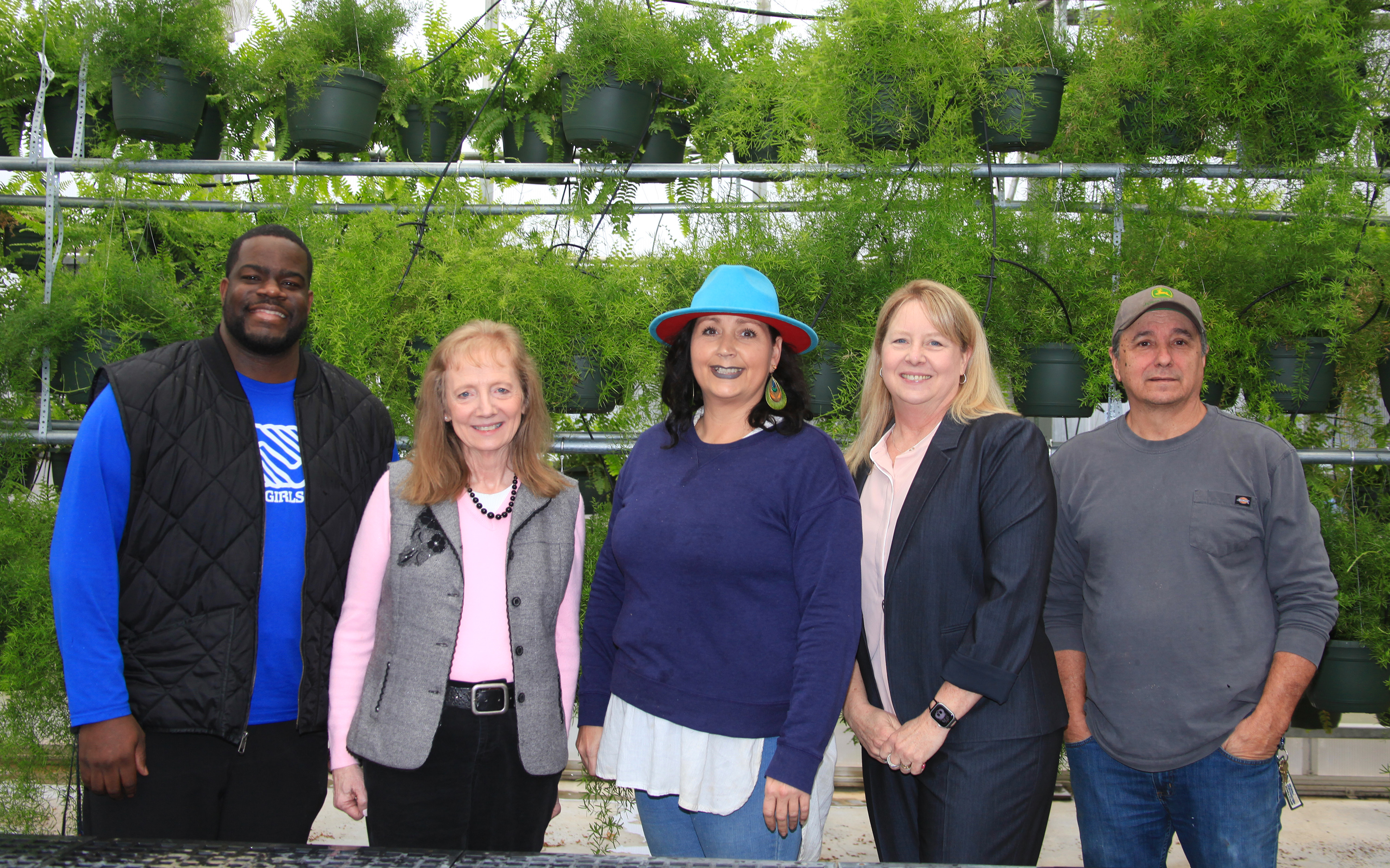(From left) Ishmael Woods, David Warren’s son-in-law; Diane Warren McCarthy, Warren’s spouse at the time of his passing; Dana Jenkins, David Warren Memorial Scholarship recipient; Dr. Heidi Popham, president of GNTC; and Nick Barton, program director and instructor of Horticulture at GNTC.