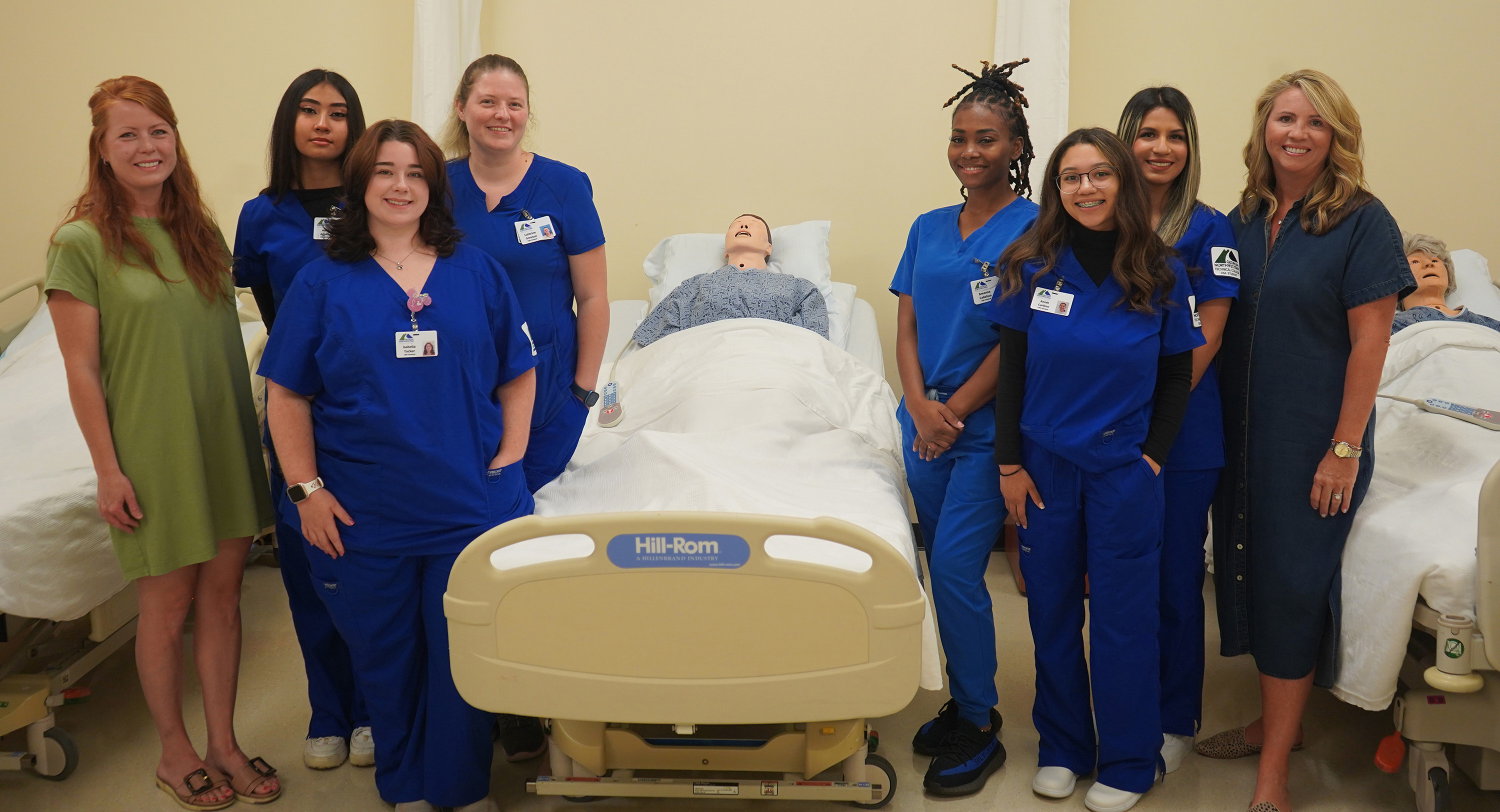 The first cohort of GNTC’s CNA (Nurse Aide Accelerated) program. (From left to right) Allie Patnode, dean of Nursing and Health Technologies at GNTC; Heidi Aguilar; Isabella Tucker; Cathrine Greeson; Breanna Callahan; Aniah Carlton; Kenia Hurtado Ortega; and Gina Clevenger, CNA instructor at GNTC. 