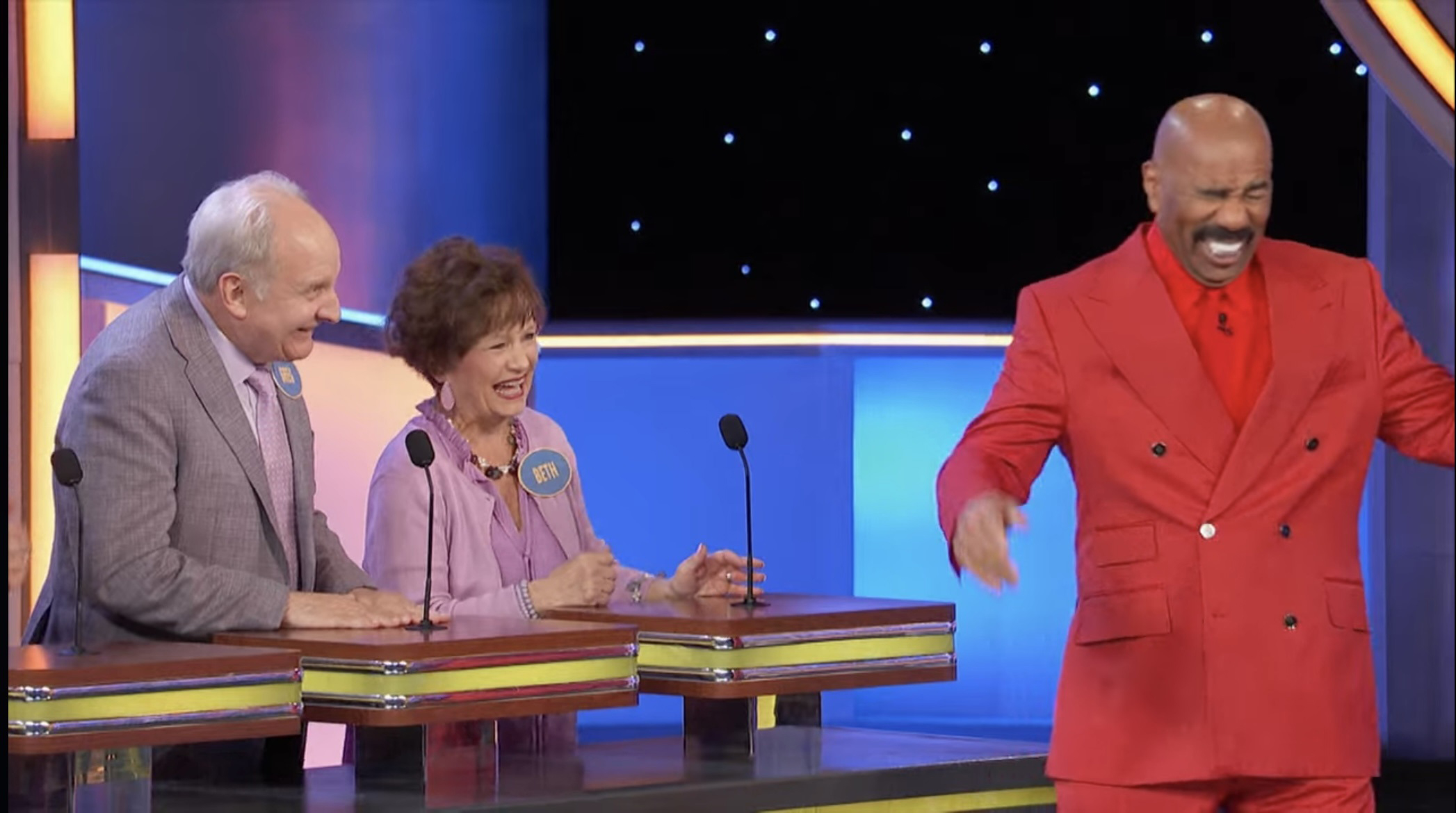 (From left) Chef Greg Paulson, program director and instructor of Culinary Arts at GNTC, and his wife Beth laugh with “Family Feud” host Steve Harvey.