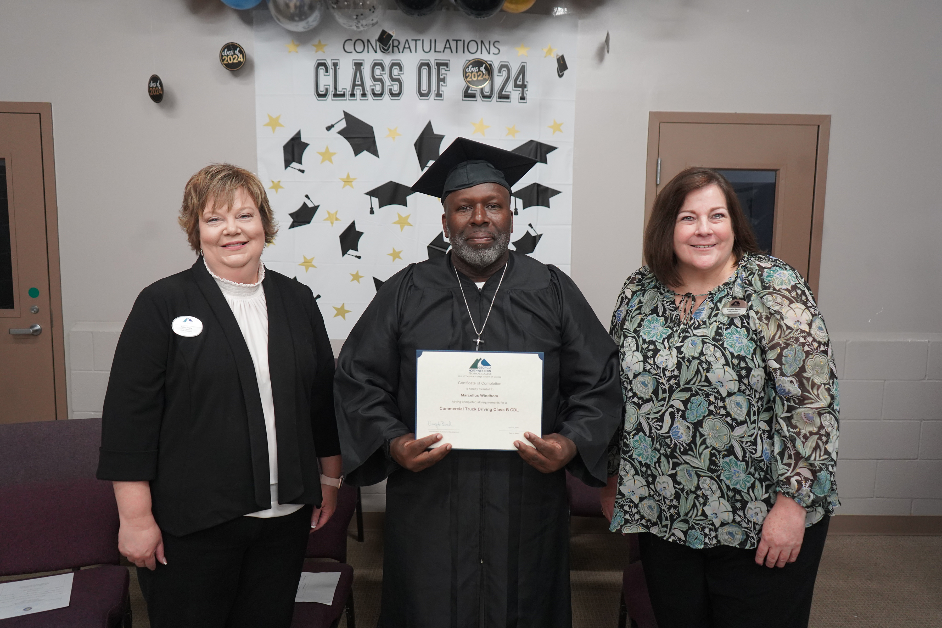 (From left) GNTC Vice President of Adult Education Lisa Shaw, Errol M. Windhom and GNTC Vice President of Economic Development Angela Berch. Windhom received his Certificate of Completion at the May 3 graduation at the Floyd County Prison.