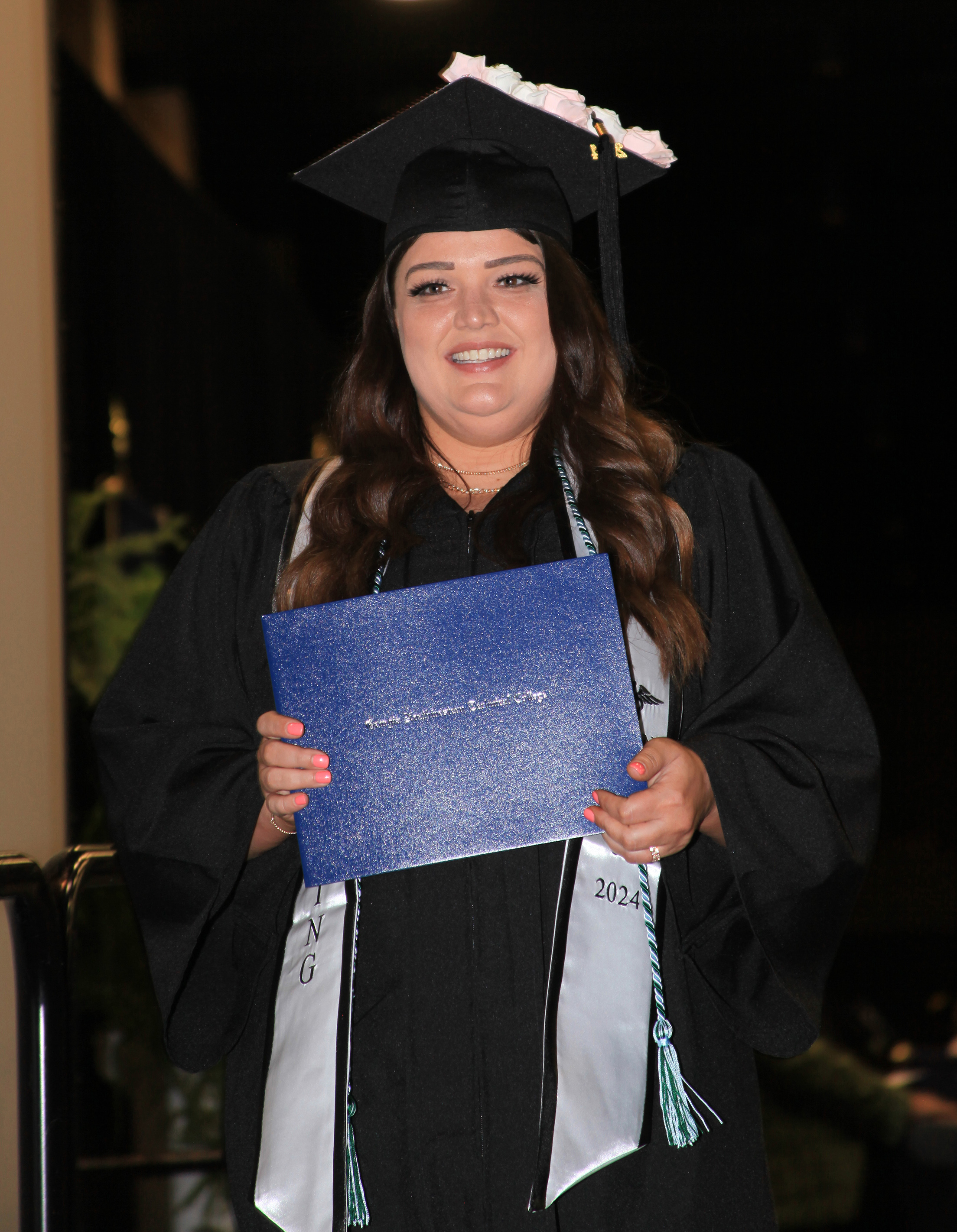 Vanessa Elise Blackmon receives her associate degree at the May 2 graduation ceremony.